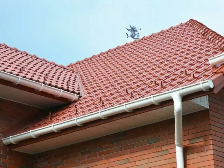 White gutters on red roof