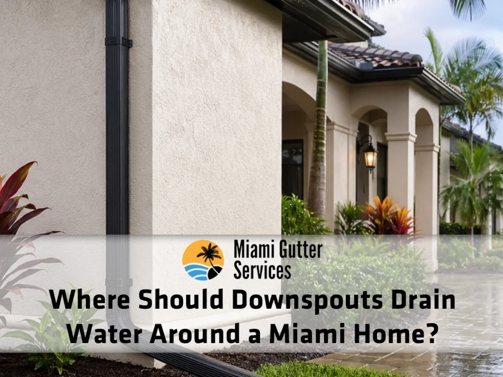 Where should downspouts drain water around a Miami home to protect the foundation and landscaping